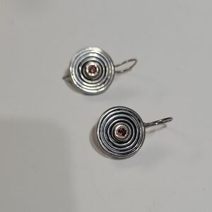 Sterling Silver Spiral Earrings with Red Gemstone by DIANE